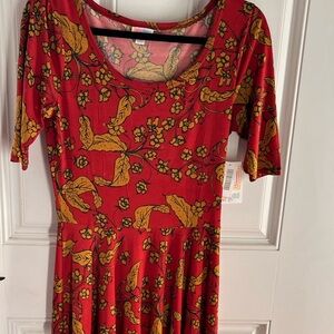Lularoe multicolor dress. Dress is new with tags discounted.